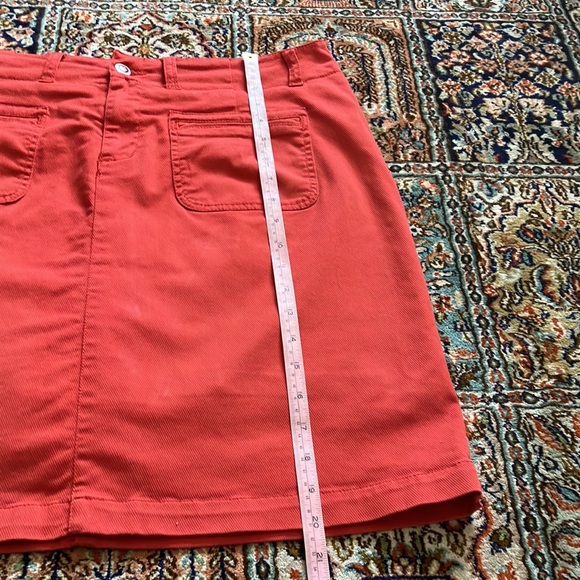 Light orange jean skirt with front and back pockets w/attached stretch shorts. - Picture 9 of 12
